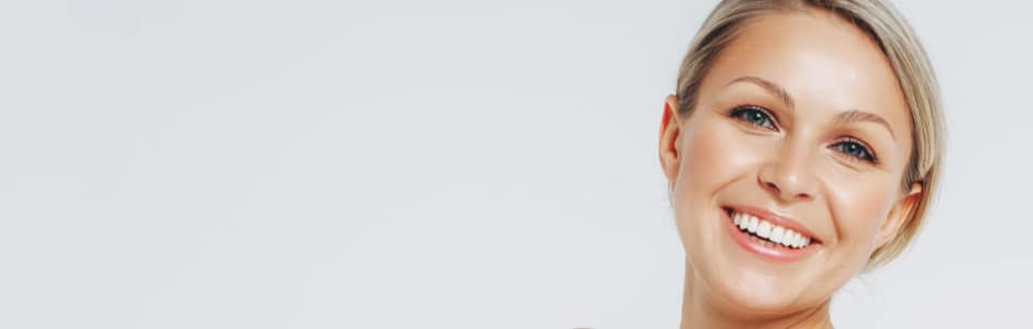Stock photograph of a smiling model with blonde hair