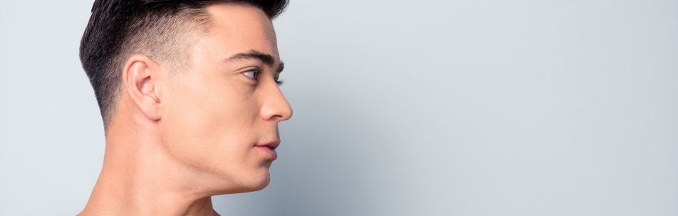 Stock photograph of a male model in profile